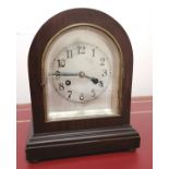 An early 20th century dome topped mahogany mantel clock. 29 cm height, 23.5 cm width.