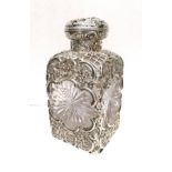 A Victorian silver mounted scent bottle, London. Dated 1894 by William Comyns and Sons. Missing