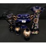 A collection of Bohemian blue glass, to include a pair of trumpet vases, with flared rims, a pair of