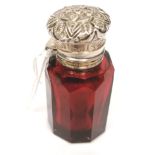 Victorian ruby glass scent bottle with chased silver top. Maker Charles May, Birmingham 190--.