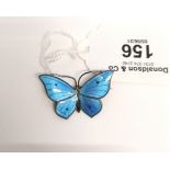 A vintage sterling silver and blue enamel butterfly brooch.