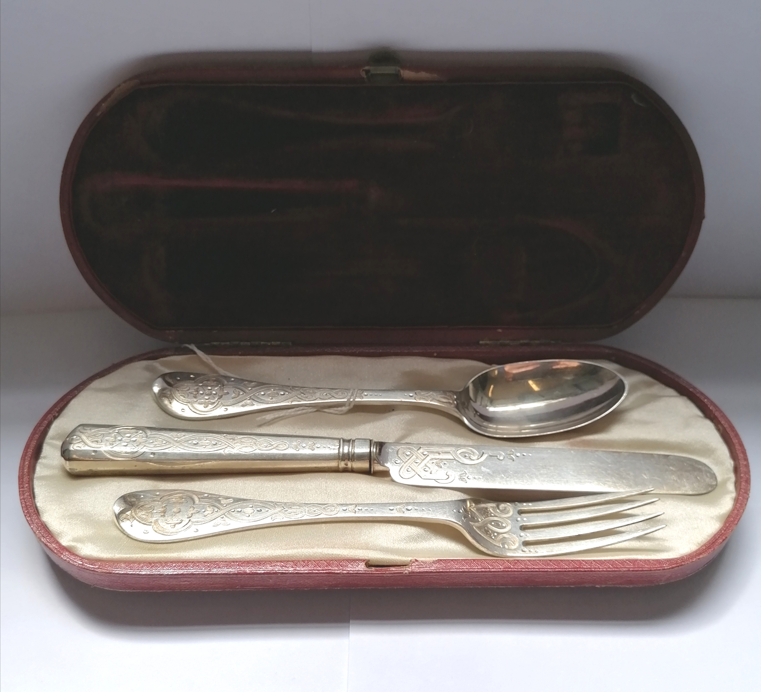 Cased Victorian silver chased three piece Christening set. London 1859, makers Joseph & Edward