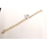 9 ct .375 Marked diamond bracelet containing 235 diamonds, a minimum 5 cts + approx and 14.3 gms