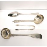 A London silver tea strainer dated 1911 together with a pair of London silver sugar nips, an