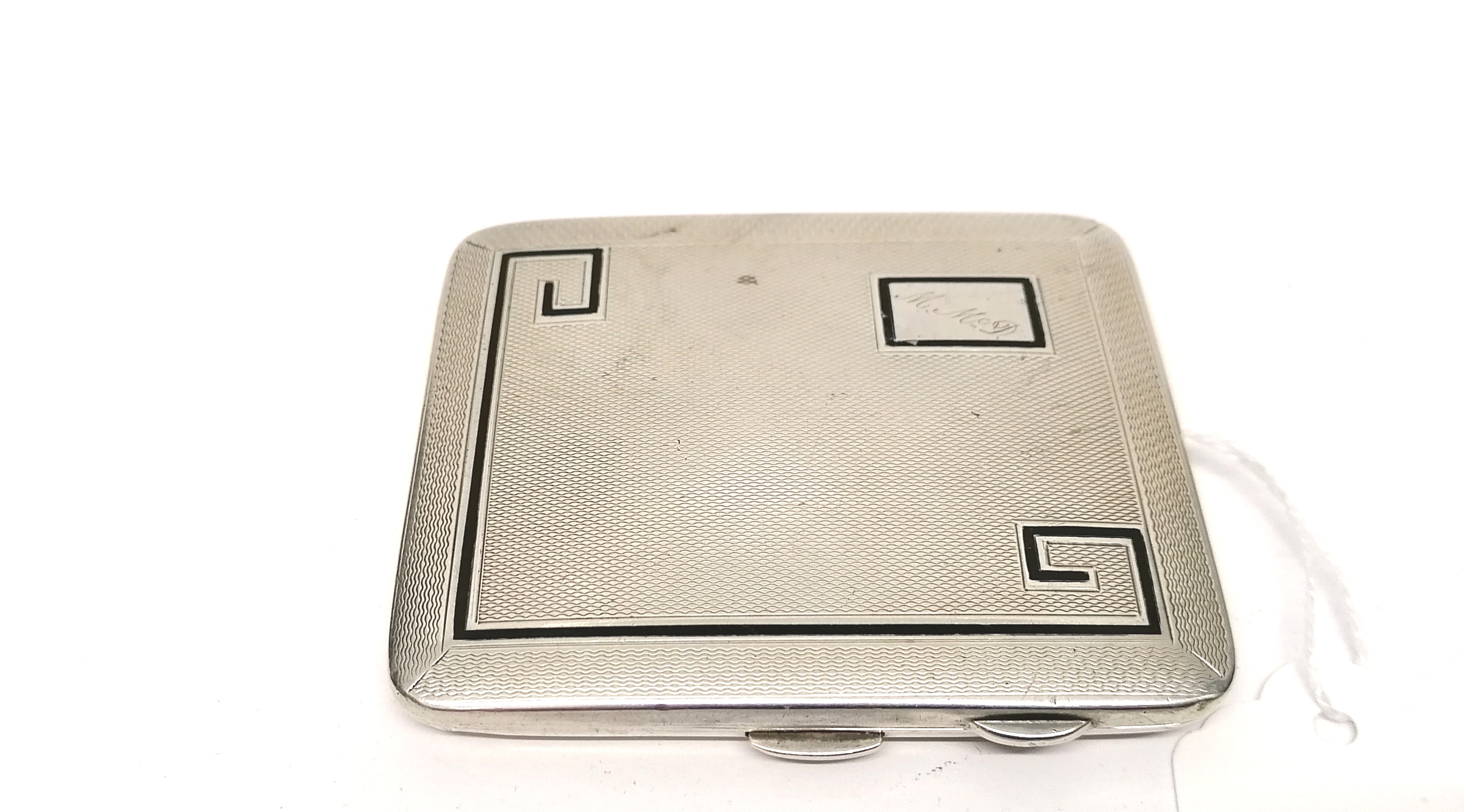 An art deco engine turned Chester silver cigarette case dated 1932. 8 cm width. 120 gms approx.