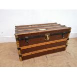 A late 19th century bound travel trunk. 92 cm width, 50 cm height, 48 cm depth.