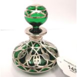 Edwardian silver overlaid green glass scent bottle circa 1910. Perfect condition.