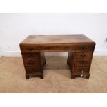 19th century mahogany twin pedestal desk having inset skiver to top above one long and two short