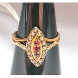 15 ct .625 Victorian marquise set ruby and pearl ring, Chester 1896.