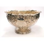 Silver fluted presentation comport style rose bowl decorated with foliate and floral chasing. Makers