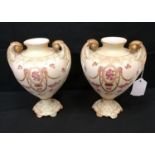 A pair of late 19th century urn shaped crown Devon vases. 20cm in height approx.