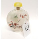 An early 20th century reverse painted Chinese scent bottle standing 10 cm height, 7 cm width