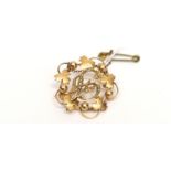 A 9 ct gold and seed pearl brooch. 4 gms approx.