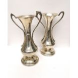 A pair of Birmingham silver art nouveau bud vases dated 1912. 15 cm height, 9 cm width approx. 332