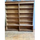 TWO MID CENTURY UTILITY BOOKSHELF UNITS WITH ADJUSTABLE SHELVING AND OPEN CUPBOARD SPACE BELOW (