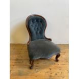 VICTORIAN MAHOGANY SPOON BACK NURSING CHAIR upholstered in blue button back material on carved