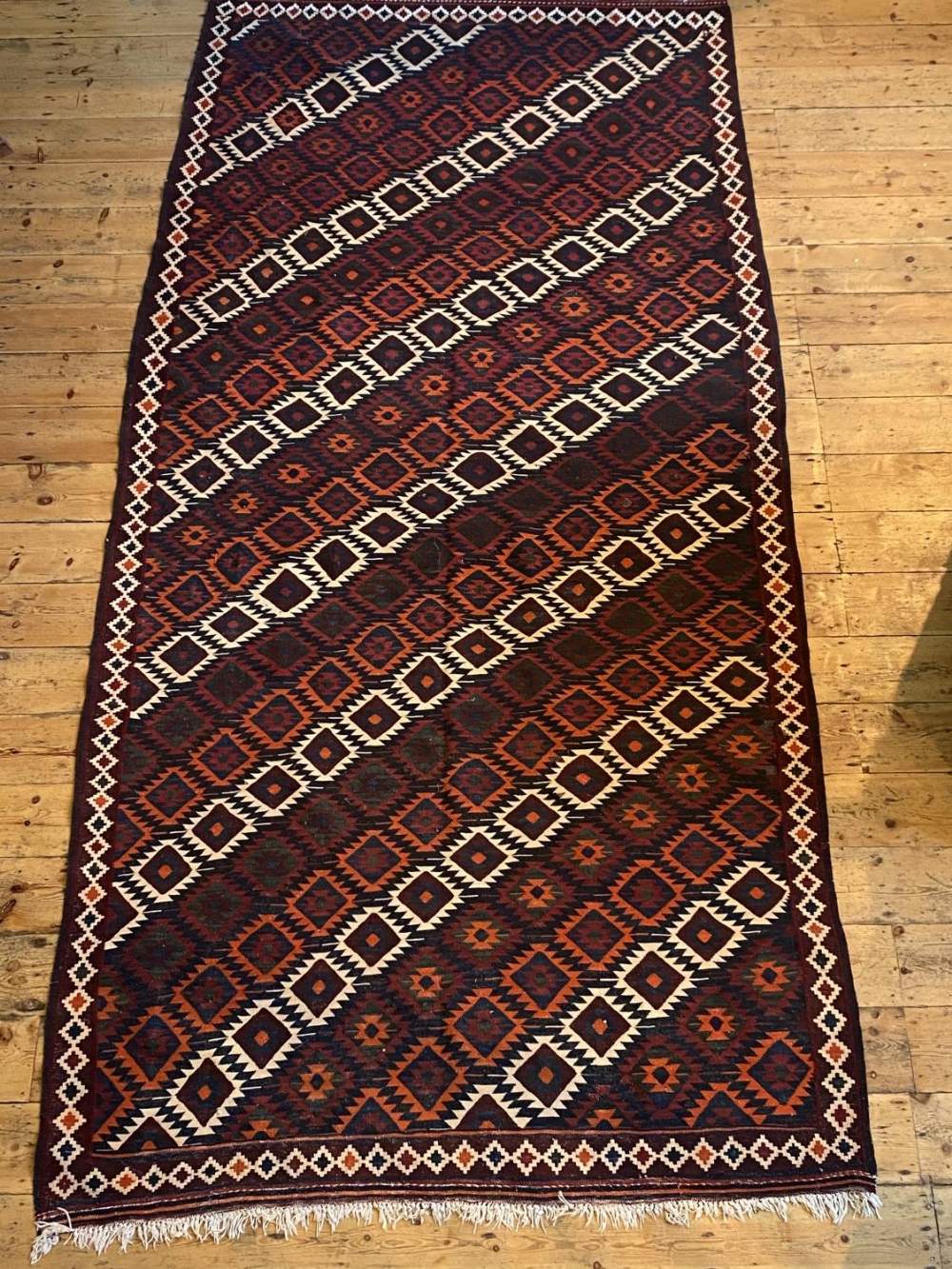 A LARGE RED AND BEIGE KHELIM&nbsp; PATTERN RUG(350cm long, 158cm wide) 