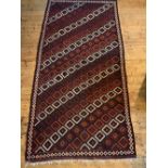 A LARGE RED AND BEIGE KHELIM  PATTERN RUG(350cm long, 158cm wide)