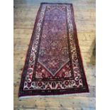 HAND KNOTTED IRANIAN HAMADAN HALL RUNNER (290cm x 114cm), with floral border pattern.
