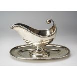 CONTINENTAL SILVER GRAVY BOATEARLY 20TH CENTURYof boat shape form, raised on an attached oval