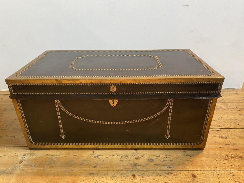 BRASS BOUND LEATHER TRUNK 18TH/19TH CENTURY WITH SIDE CARRYING HANDLES &amp; STUDDED DECORATION47cm 