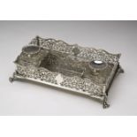 GOOD VICTORIAN SILVER INKSTANDGEORGE FOX, LONDON 1886the ornate foliate pierced sides with a