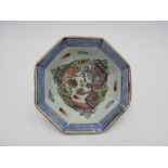 JAPANESE IMARI ENAMELLED OCTAGONAL BOWL 18TH/19TH CENTURY painted with a polychromatic dragon amidst