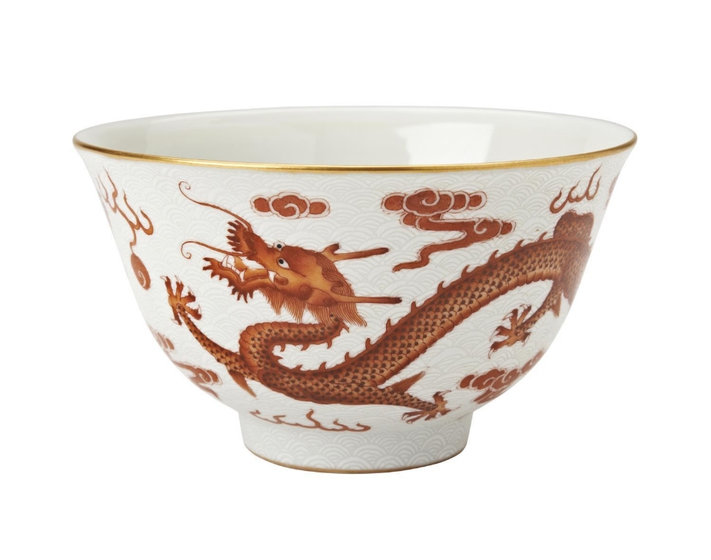 IRON-RED 'DRAGON' BOWL the scrafitto decorated sides painted with two dragons chasing flaming pearls