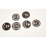 GROUP OF SIX JAPANESE IRON TSUBA EDO PERIOD each of openwork form largest, 7cm wide, smallest, 6.5cm