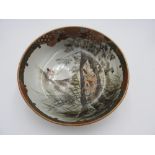 KUTANI ENAMELLED DEEP DISH 19TH CENTURY depicting samurai shooting in woods, dotted 'Ao-Chibu'