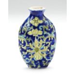 MINIATURE BLUE GROUND 'LOTUS' BOTTLE VASE LATE QING DYNASTY with an apocryphal Qianlong seal mark
