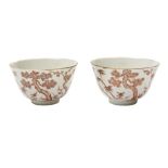 PAIR OF IRON-RED AND GILT DECORORATED BOWLS TONGZHI SEAL MARKS AND OF THE PERIOD the sodes painted