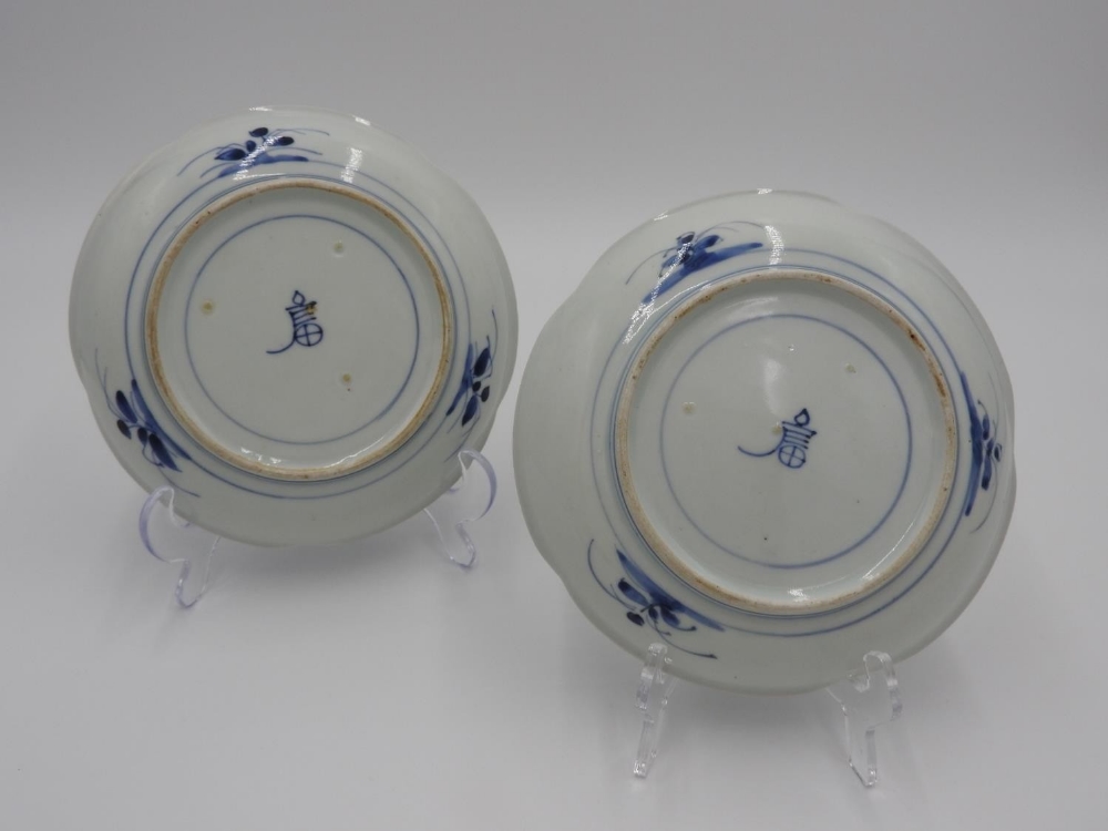 PAIR OF IMARI BLUE AND WHITE ROBED DISHES 18TH CENTURY painted with stylised flowers and butterflies - Image 2 of 2