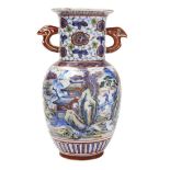 IRON-RED AND UNDERGLAZE BLUE 'LANDSCAPE' VASE KANGXI PERIOD the baluster sides decorated with a