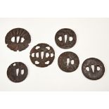 GROUP OF SIX JAPANESE IRON TSUBA EDO PERIOD largest, 8.5cm wide, smallest, 6.5cm wide