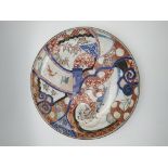 LARGE IMARI ENEMELLED DISH EDO PERIOD painted with scrolls and 'ruyi' heads in underglaze blue,