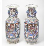 LARGE PAIR OF CANTON FAMILLE ROSE VASES QING DYNASTY, 19TH CENTURY each painted with panels