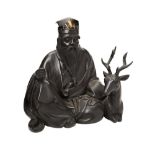 JAPANESE BRONZE FIGURE OF JAROJIN AND A DEER MEIJI PERIOD the seated deity with a long beard a