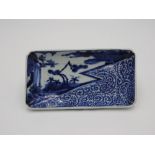 JAPANESE BLUE AND WHITE RECTANGULAR DISH, NAGAZARA EDO PERIOD, 18TH CENTURY painted with panels