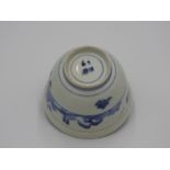 JAPANESE BLUE AND WHITE TEA BOWL MEIJI PERIOD painted with pagoda and mountains 9.5cm diam