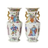 PAIR OF CANTON HEXAGONAL VASES QING DYNASTY, 19TH CENTURY painted with figures, flowering baskets