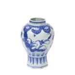 BLUE AND WHITE HEXAGONAL BALUSTER VASE TRANSITIONAL PERIOD OR LATER the sides painted in tones of
