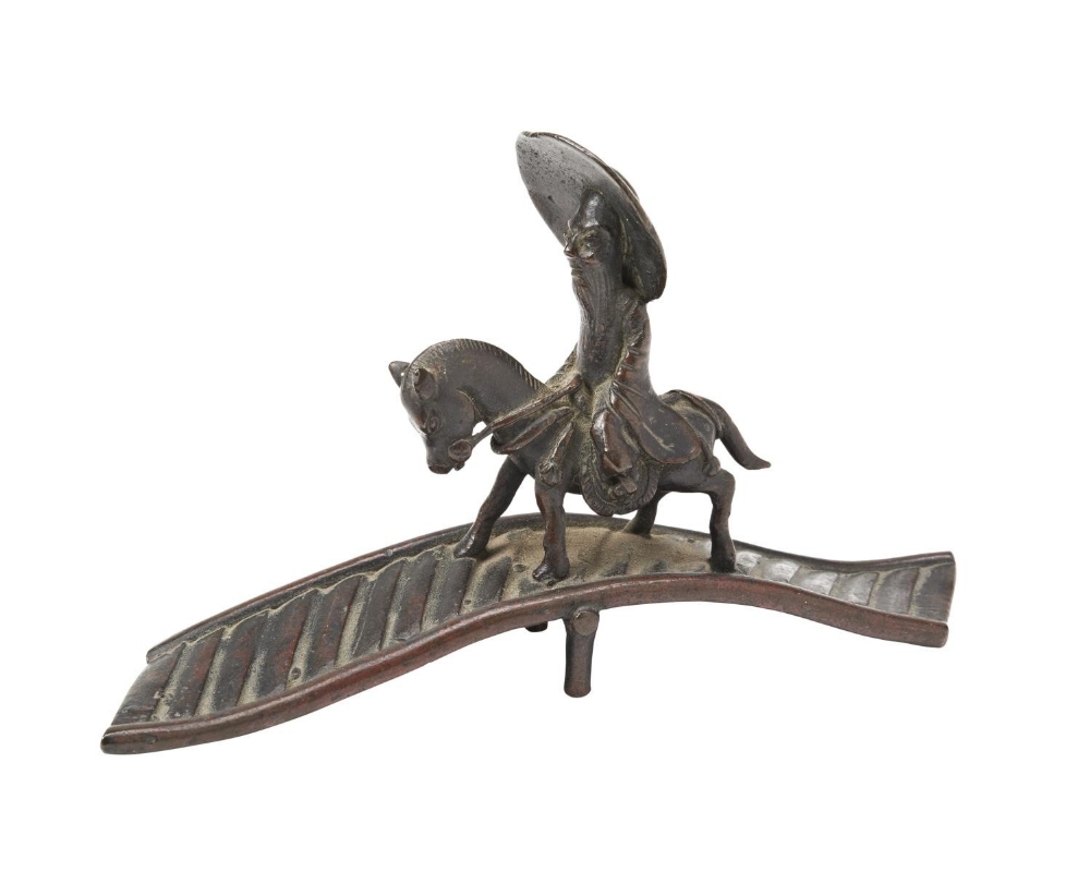 BRONZE BRUSH REST MING OR LATER&nbsp; modelled as a old man riding a horse across a bridge&nbsp; 8cm