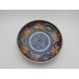 IMARI ENAMELLED BOWL 19TH CENTURY painted in the interior with a central medallion of underglaze