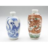 TWO PORCELAIN SNUFF BOTTLES LATE QING DYNASTY comprising one blue and white, and the decorated