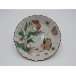 JAPANESE IMARI LOBED DISH EDO PERIOD CIRCA 1690 - 1710 painted with birds and butterflies in a rocky