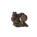 BRONZE SCROLL WEIGHT QING DYNASTY, 19TH CENTURY modelled as a seated boy holding a drum 5cm high