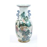 LARGE FAMILLE ROSE BALUSTER VASE 19TH / 20TH CENTURY the baluster sides painted with a continuous
