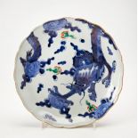 IMARI BLUE AND WHITE LOBED PLATE EDO PERIOD decorated in? somenishikide? style with a dragon