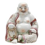 LARGE FAMILLE ROSE FIGURE OF A LAUGHING BUDDHA REPUBLIC PERIOD shown wearing a long flowing robe